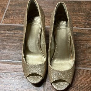 Fergalicious gold glitter heels